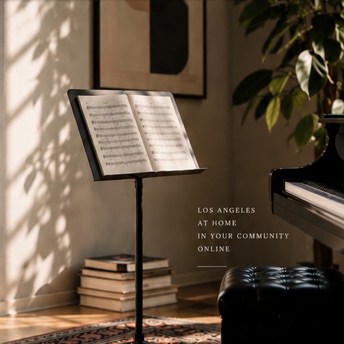 Sunlit music room with open sheet music and piano