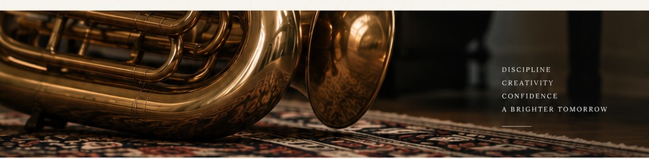 Close view of a brass instrument resting on a rug